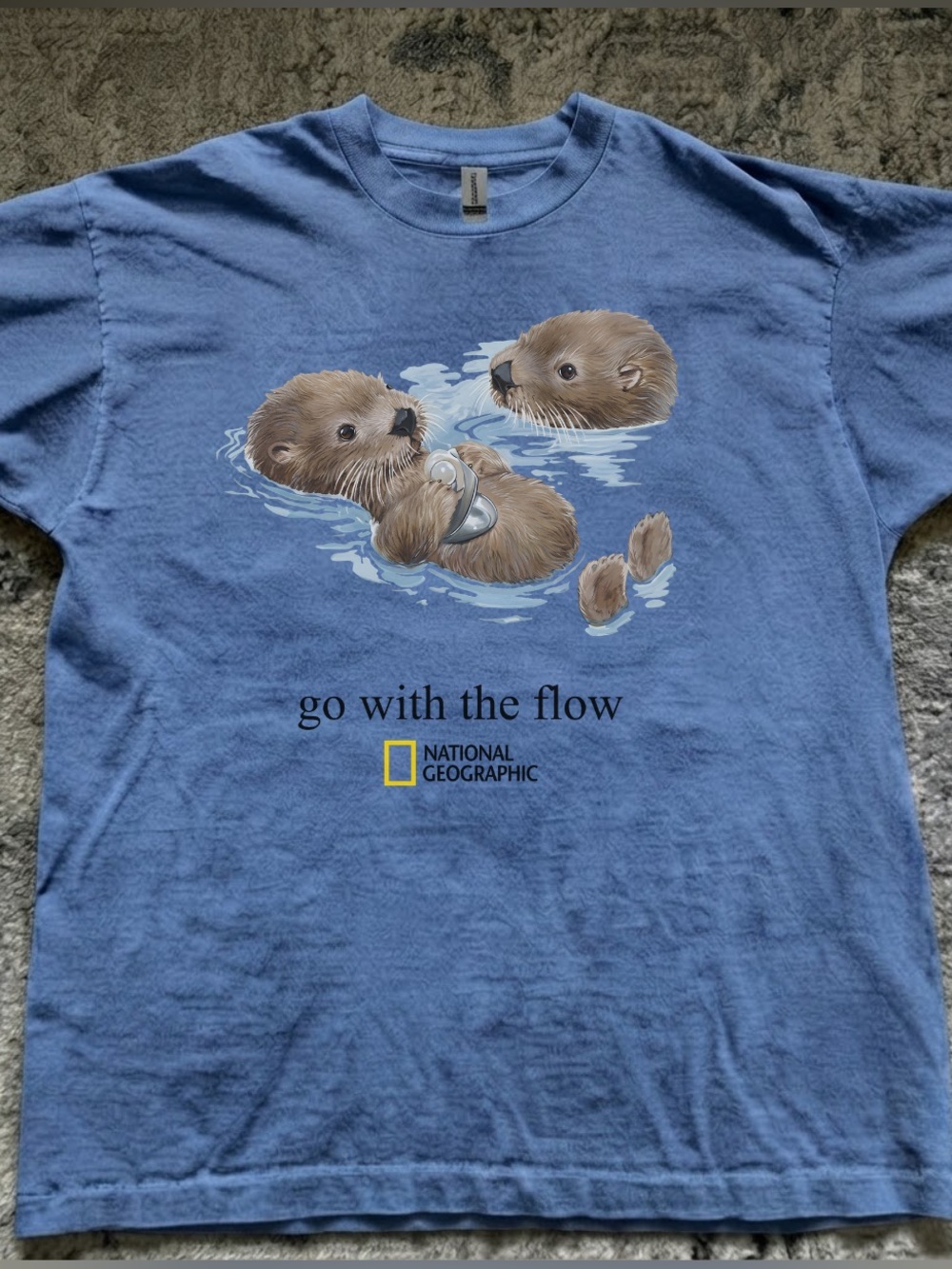 Gildan Unisex’s Carolina Blue Otters “Go with the flow” Graphic Tee